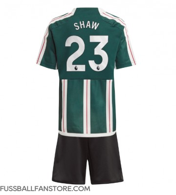 Manchester United Luke Shaw #23 Replik Auswärtstrikot Kinder 2023-24 Kurzarm (+ Kurze Hosen)